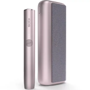 Sleek white IQOS heated tobacco device with holder and charger
