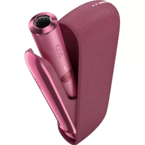 Sleek white IQOS heated tobacco device with holder and charger